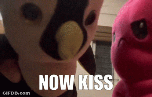 Two Stuffed Animals Now Kiss GIF