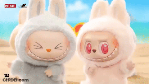 Two Stuffed Animals On Beach With Pop Mart Logo GIF