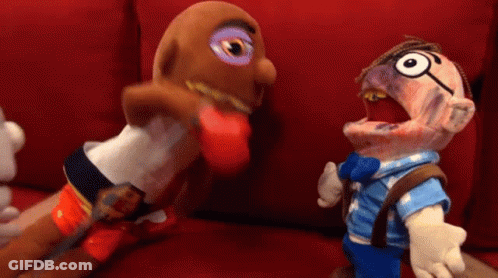 Two Stuffed Animals On Red Couch GIF