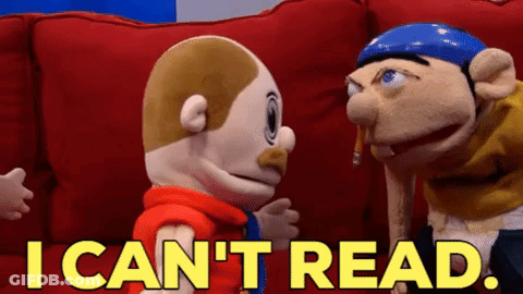 Two Stuffed Animals On Red Couch Saying I Can't Read GIF