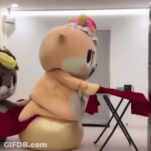 Two Stuffed Animals One Holding Red Cloth GIF