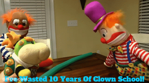 Two Stuffed Clowns With I've Wasted 10 Years Of Clown School GIF