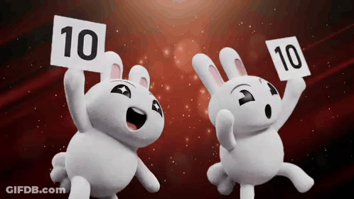 Two Stuffed Rabbits Are Holding Up Signs With The Number 10 On Them GIF