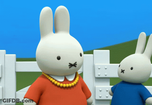 Two Stuffed Rabbits With Crossed Noses GIF
