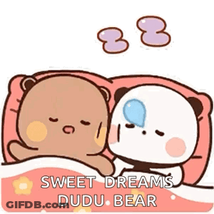 Two Teddy Bears Are Sleeping Next To Each Other In Bed . GIF