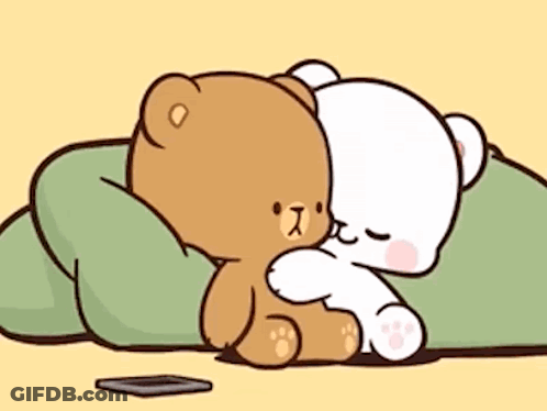 Two Teddy Bears Hugging On A Blanket GIF