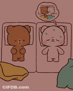 Two Teddy Bears Laying On Bed GIF