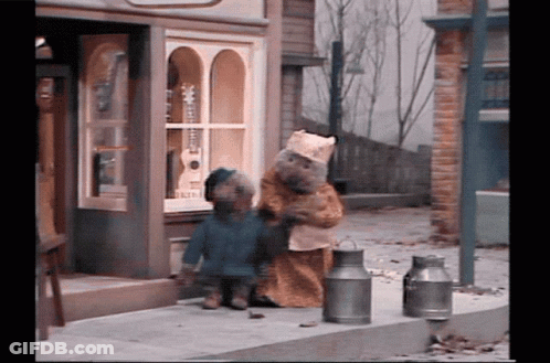 Two Teddy Bears Outside Store GIF