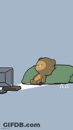 Two Teddy Bears Sitting In Front Of Computer GIF