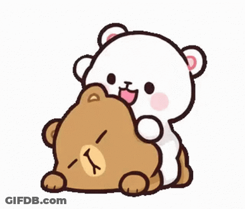 Two Teddy Bears Sitting Next To Each Other Looking GIF
