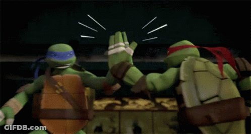 Two Teenage Mutant Ninja Turtles Are Fighting Each Other In A Dark Room . GIF