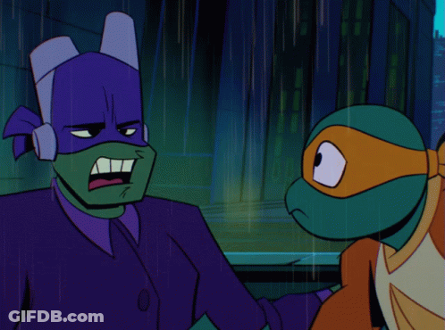 Two Teenage Mutant Ninja Turtles Are Standing Next To Each Other GIF