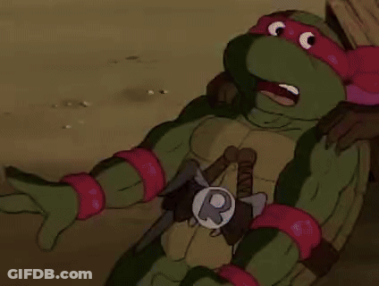 Two Teenage Mutant Ninja Turtles Reading On Couch GIF