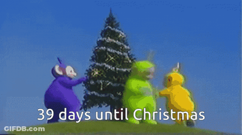 Two Teletubbies Beside Christmas Tree Saying 39 Days Until Christmas GIF