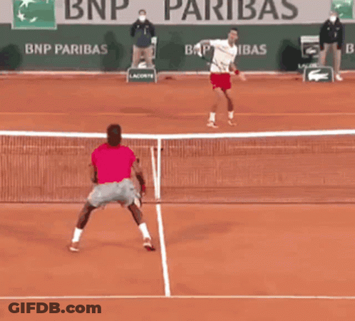 Two Tennis Players Are Playing On A Court With Bnp Paribas Advertisements In The Background GIF