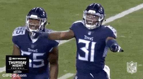 Two Titans Football Players Celebrating Touchdown GIF