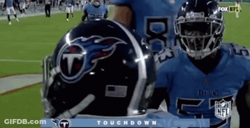 Two Titans Football Players During Touchdown GIF