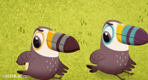Two Toucans Standing In Green Field GIF