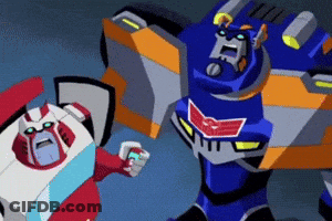 Two Transformers Standing Together GIF