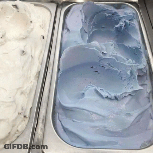 Two Trays Of Ice Cream One Of Which Is White And One Of Which Is Blue GIF