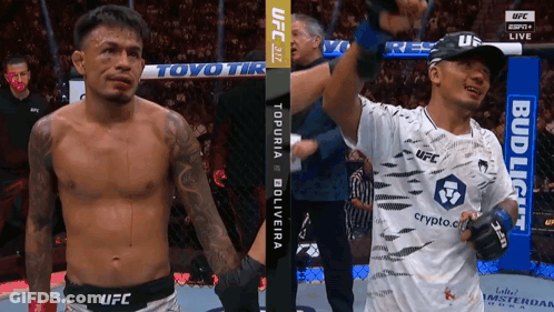 Two UFC Fighters Standing Next To Each Other GIF