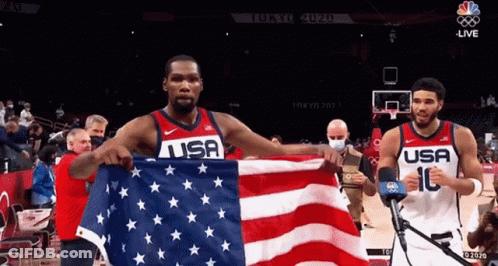 Two USA Basketball Players Holding American Flag GIF