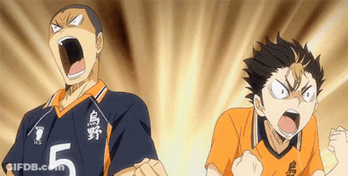 Two Volleyball Players Are Standing Next To Each Other With Their Mouths Open . GIF