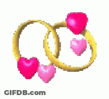 Two Wedding Rings With Pink Hearts Surrounding Them On A White Background GIF