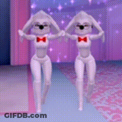 Two White Rabbits Wearing Red Bow Ties Are Dancing On A Stage GIF