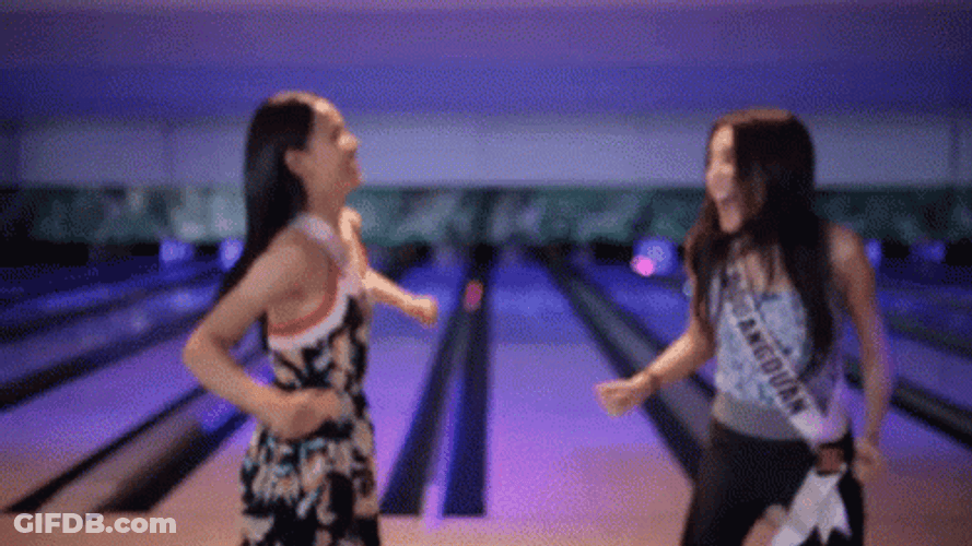Two Woman Laughing Bowling Alley GIF