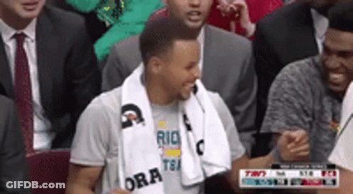 Two Women And Man In SLS Shirt In Stadium GIF