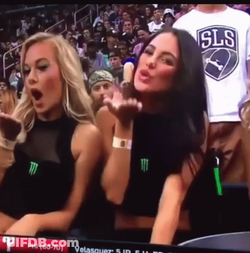 Two Women And Man In SLS Shirt Stadium GIF