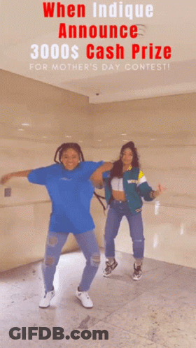Two Women Are Dancing In Front Of A Sign That Says 3000 $ Cash Prize For Mother 'S Day Contest GIF