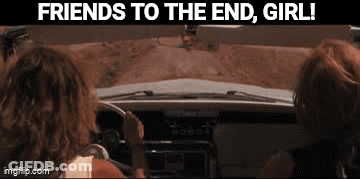 Two Women Are Driving A Car With The Words `` Friends To The End , Girl ! '' Written On The Bottom . GIF
