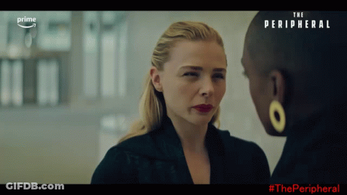 Two Women Are Looking At Each Other With The Words The Peripheral Behind Them GIF