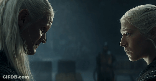 Two Women Are Looking At Each Other With The Words Winter Is Coming Above Them GIF