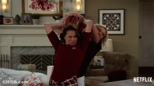 Women Playing Basketball In Living Room GIF