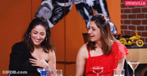 Two Women Are Sitting At A Table With Drinks And A Pinkvilla Logo In The Background GIF