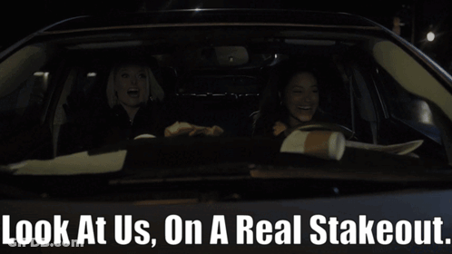 Two Women Are Sitting In A Car With The Words Look At Us On A Real Stakeout GIF