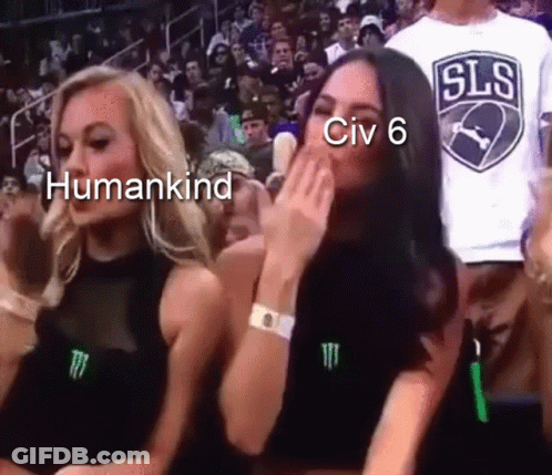 Two Women Are Sitting In A Crowd And One Of Them Is Wearing A Shirt That Says ' Sls ' On It GIF