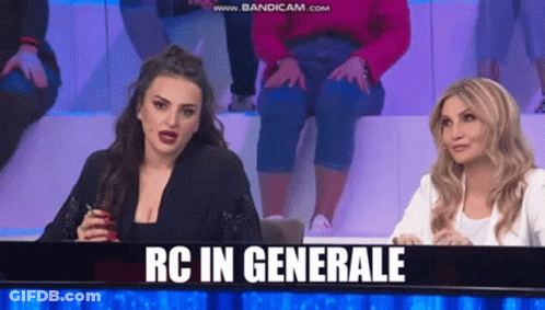 Two Women Are Sitting In Front Of A Sign That Says Rc In Generale On It GIF