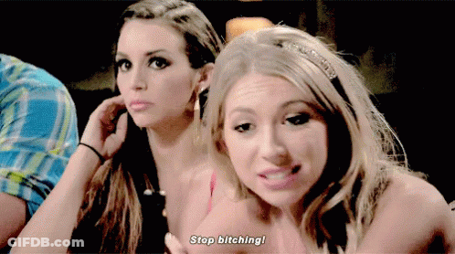 Two Women Are Sitting Next To Each Other And One Of Them Says Stop Bitching GIF