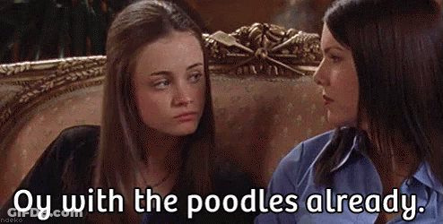 Two Women Are Sitting Next To Each Other On A Couch And One Of Them Is Talking To The Other . GIF