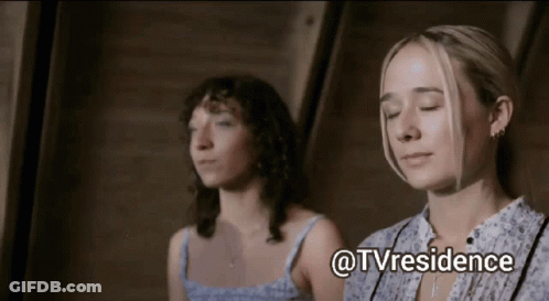 Two Women Are Sitting Next To Each Other With Their Eyes Closed And The Words @Tvresidence Written Above Them GIF