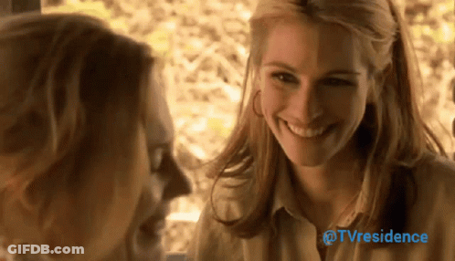 Two Women Are Smiling And Looking At Each Other With The Words Tvresidence In The Upper Right Corner GIF