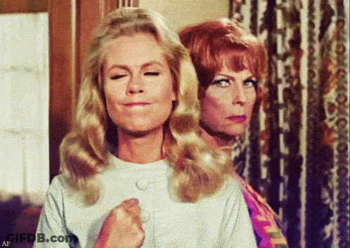 Two Women Are Standing Next To Each Other And One Of Them Is Making A Funny Face GIF