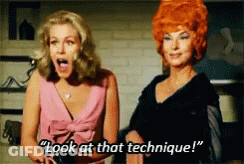 Two Women Are Standing Next To Each Other And One Of Them Is Saying " Look At That Technique " GIF