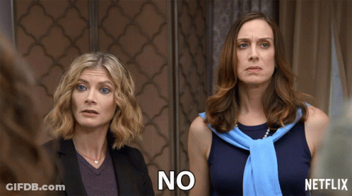 Two Women Standing One Saying No GIF