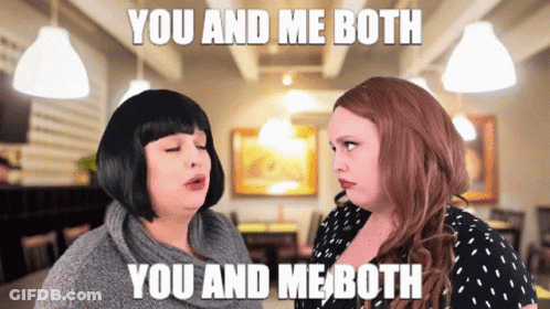 Two Women Are Standing Next To Each Other And One Of Them Is Saying You And Me Both You And Me Both GIF