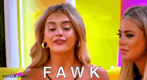 Two Women Are Standing Next To Each Other And One Of Them Is Wearing A Necklace That Says Fawk On It . GIF